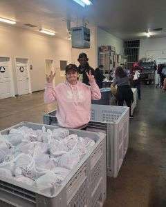 Volunteers preparing food in the Catholic Charities of Merced