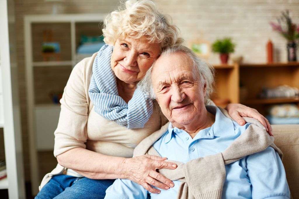 Senior couple sitting together