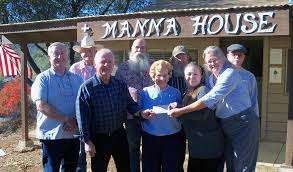 Group of people in front of the Manna House