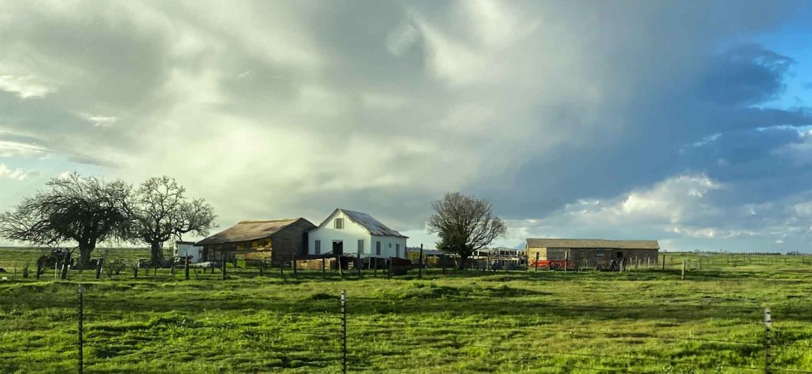 Farm house and barn in rural areal of Merced, California